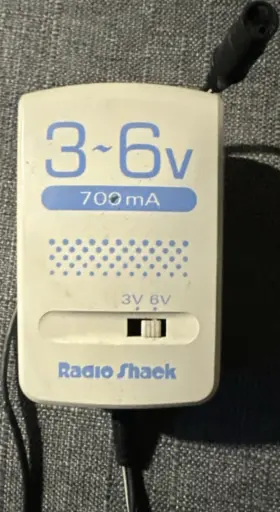 Radioshack 273-1003a Ac/dc Adapter 3v 6v 700ma Beige Model Dual Output Voltage