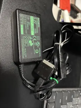 PEGTJ25 SONY Ac Power Adapter Clie Dongle