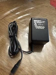 Radio Shack Ac/dc Adapter Cat. No. 43-1241 Input: 120 Vac Output: 12 Vdc 400ma. Fixed Price $16.00.