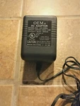 Genuine Oem Ad-0980l Ac Power Supply Adapter Charger Output 9v 800ma. Fixed Price $18.00.