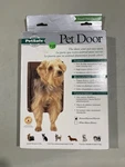 New Petsafe Brand Brown Pet Door In Original Box - Small/up To 12 Lbs. Ts-2-11. Fixed Price $15.95.