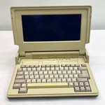 Tandy 1400 Lt Vintage Portable Personal Computer Laptop, 25-3500. Fixed Price $119.99.
